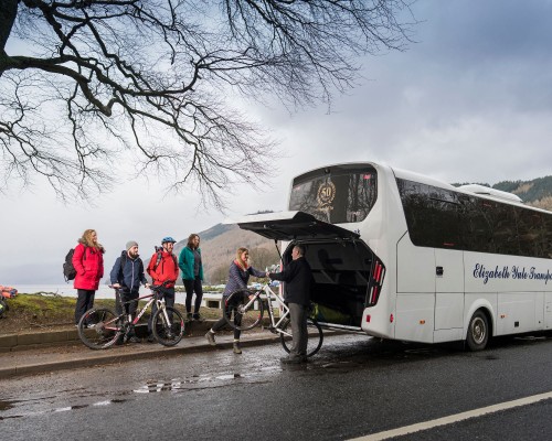 Loading bikes onto a Yules Kenmore Loop bus by Loch Tay
